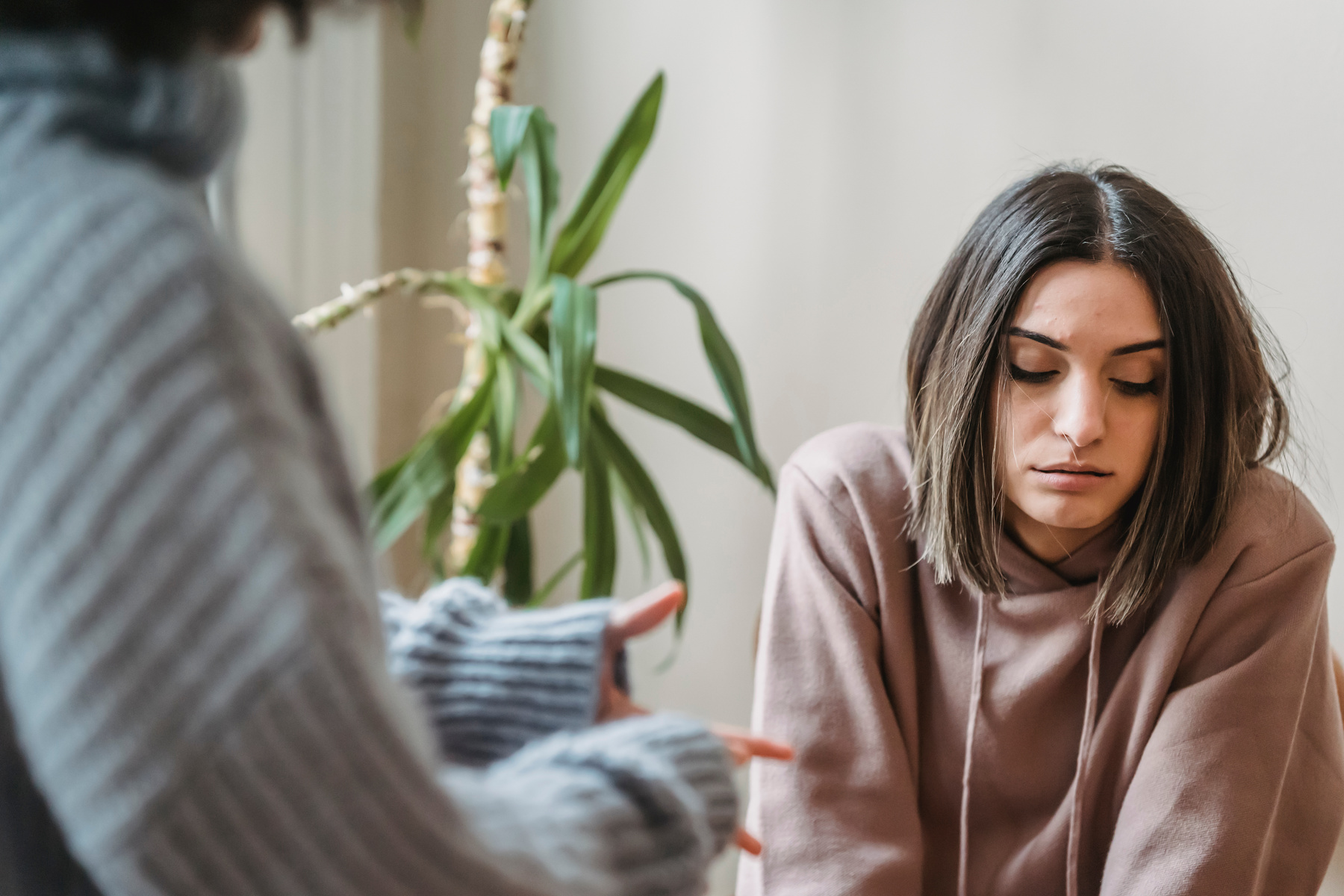 Unhappy woman having argument with crop female